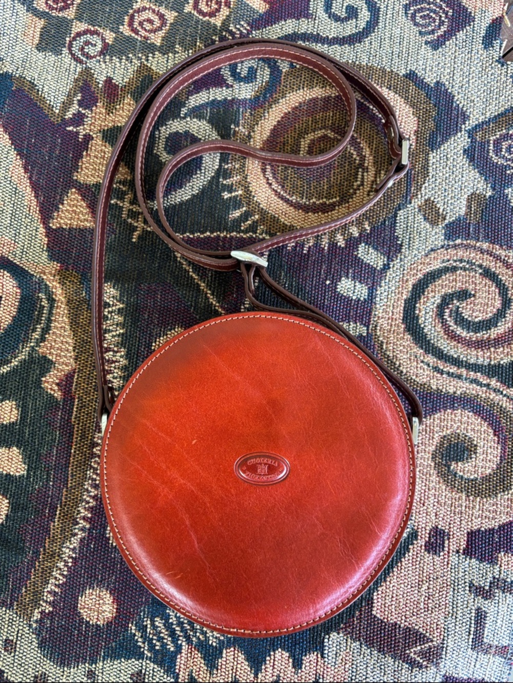 Round Leather Crossbody Bag in Cherry Red by Cuoieria Fiorentina